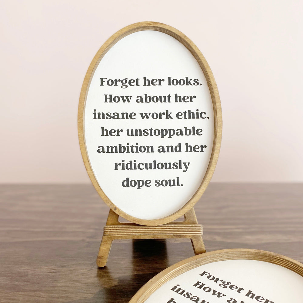 Forget Her Looks Tabletop Sign